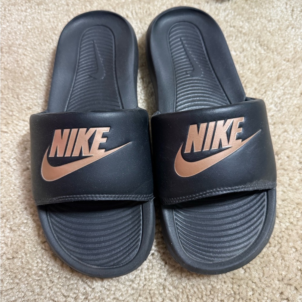 Nike Black Slides with Gold Logo